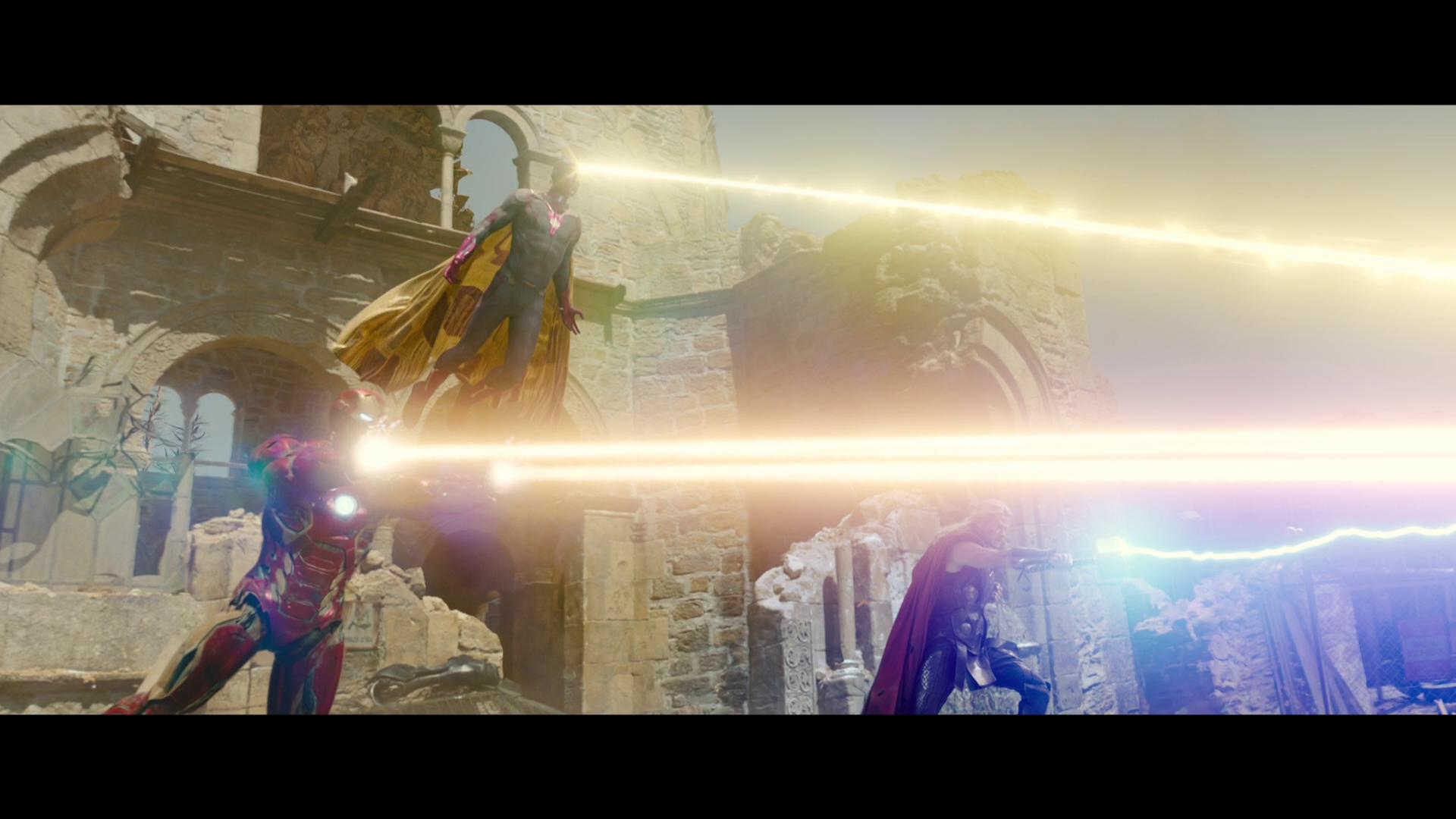 iron-man-vision-and-thor-shoot-beams-of-light iron man, vision and thor shoot beams of light